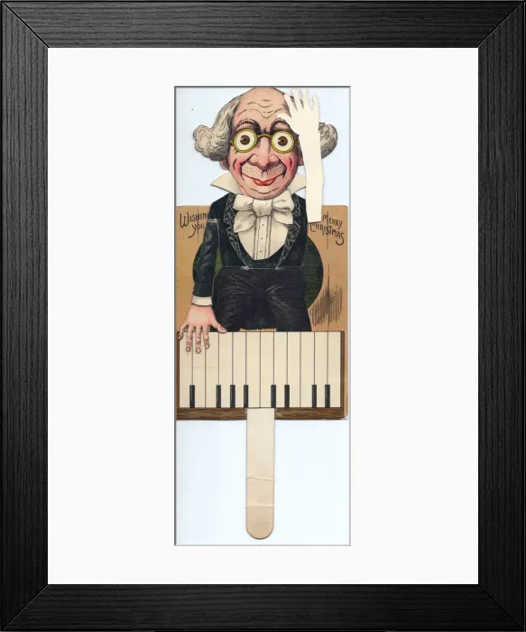 Framed Print : Man playing the piano on a cutout Christmas card Framed Print : Man playing the piano on a cutout Christmas card