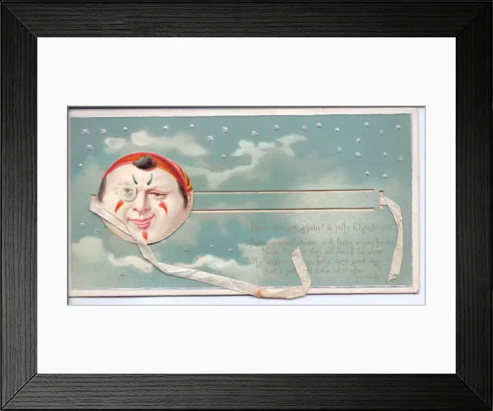 Framed Print : Clowns smiling face on a movable Christmas card Framed Print : Clowns smiling face on a movable Christmas card