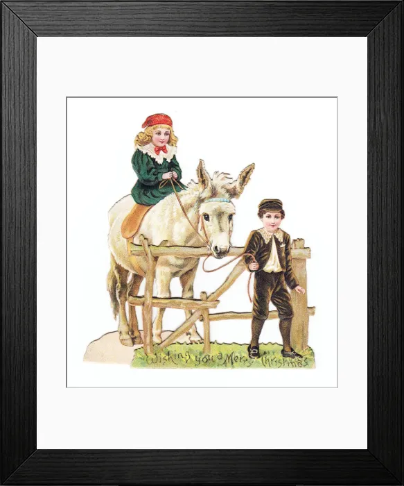 Framed Print : Girl and boy with a donkey on a cutout Christmas card Framed Print : Girl and boy with a donkey on a cutout Christmas card