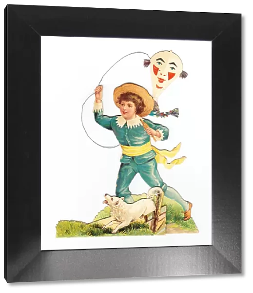 Boy with dog and kite on a cutout greetings card