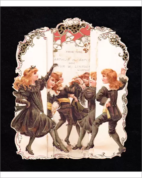 Children dancing on a cutout Christmas card