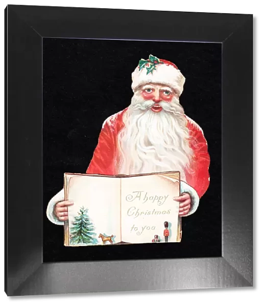 Santa Claus with an open book on a cutout Christmas card