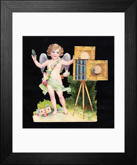 Framed Print : Cupid with a camera on a cutout greetings card Framed Print : Cupid with a camera on a cutout greetings card