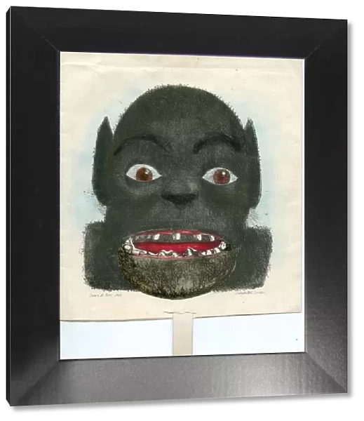 Monsters face with tab pull on a greetings card