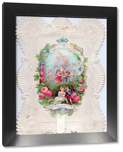 Cherubs and roses on a Christmas card