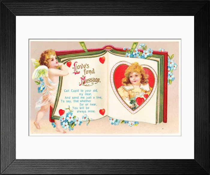 Framed Print : Cupid with open book on a Valentine postcard Framed Print : Cupid with open book on a Valentine postcard