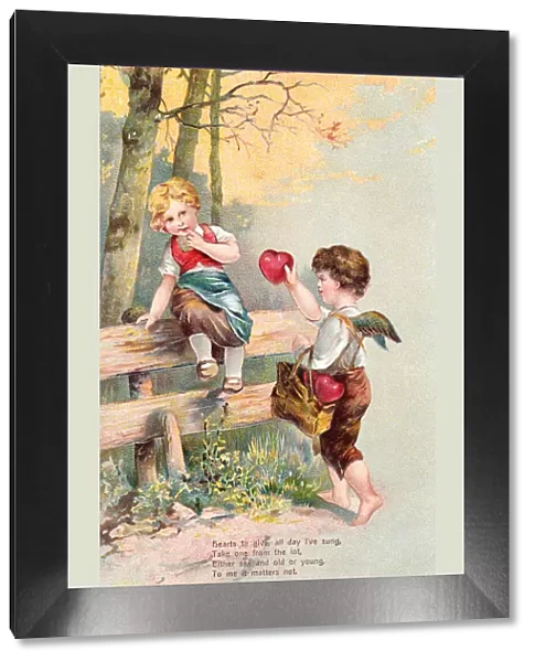 Cupid offering a red heart on a Valentine postcard