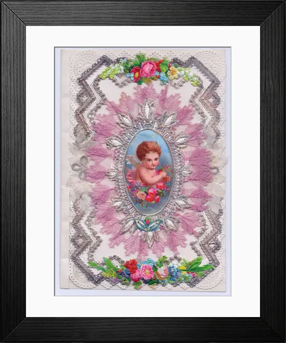 Framed Print : Cherub with flowers on a paper lace greetings card Framed Print : Cherub with flowers on a paper lace greetings card