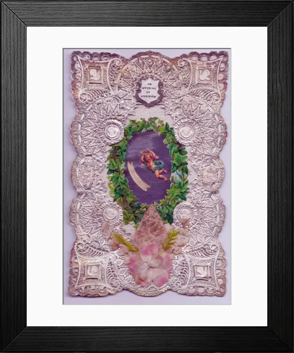 Framed Print : Cupid with ivy leaves on a paper lace romantic card Framed Print : Cupid with ivy leaves on a paper lace romantic card