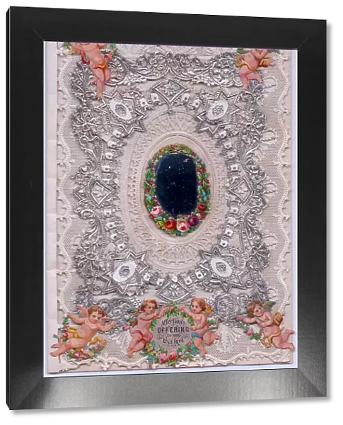 Cupids and flowers on a romantic paper lace card