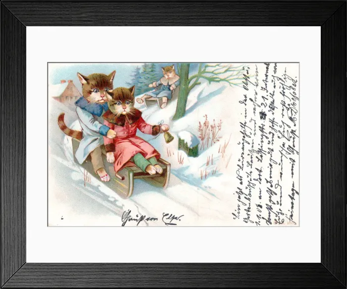 Framed Print : Cats on sleds in the snow on a postcard Framed Print : Cats on sleds in the snow on a postcard