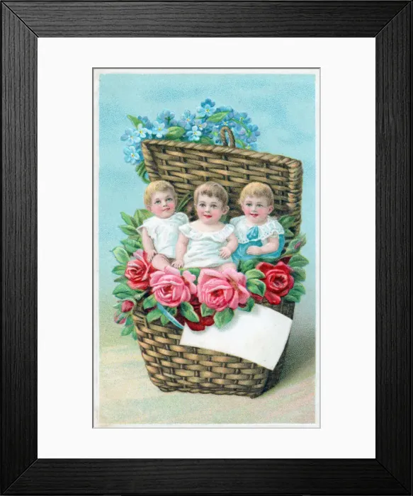 Framed Print : Children in a basket of flowers on a greetings postcard Framed Print : Children in a basket of flowers on a greetings postcard