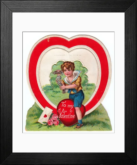 Framed Print : Boy with telephone on a heart-shaped Valentine card Framed Print : Boy with telephone on a heart-shaped Valentine card