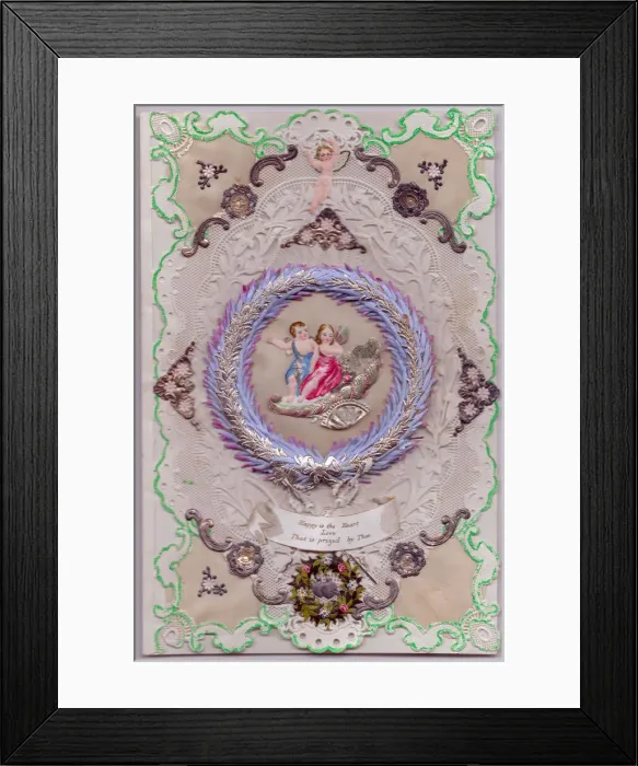 Framed Print : Cupids and flowers on a paper lace romantic card Framed Print : Cupids and flowers on a paper lace romantic card