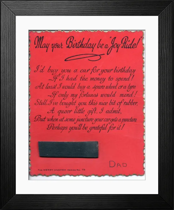 Framed Print : Strip of rubber with comic verse on a birthday card Framed Print : Strip of rubber with comic verse on a birthday card
