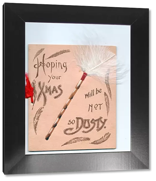 Feather duster with comic greeting on a Christmas card