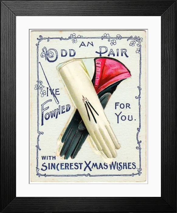 Framed Print : Odd pair of gloves with comic greeting on a Christmas card Framed Print : Odd pair of gloves with comic greeting on a Christmas card