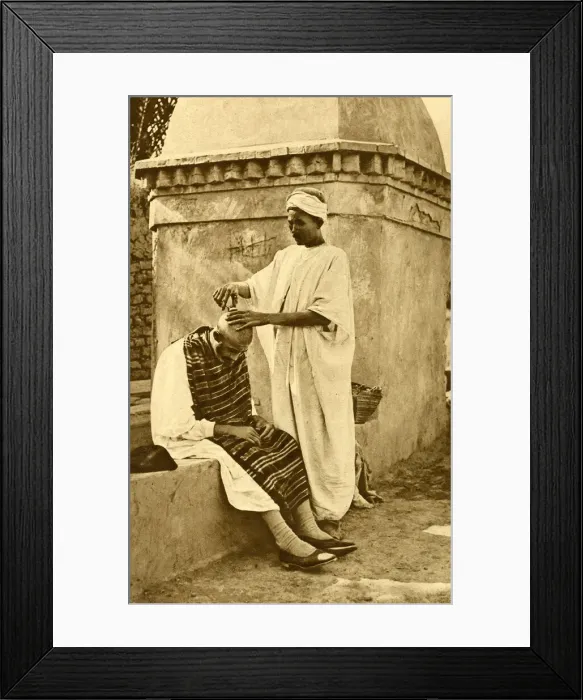 Framed Print : Saharan barber and client, Algeria, North Africa Framed Print : Saharan barber and client, Algeria, North Africa