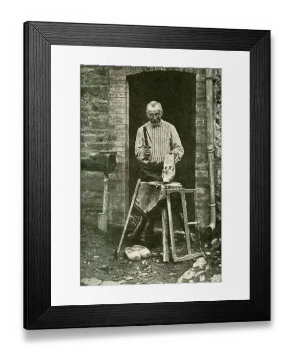 Framed Print : Sabot maker working at his cottage door, Belgium Framed Print : Sabot maker working at his cottage door, Belgium