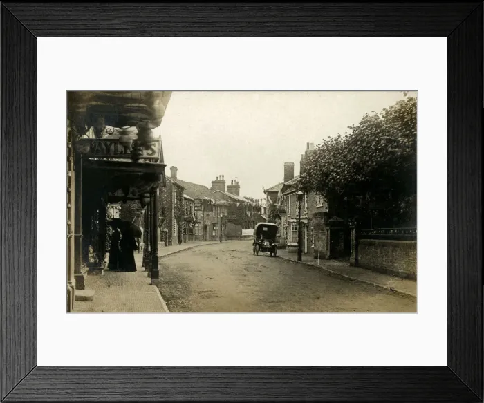 Framed Print : Pewsey, Wiltshire - High Street with Waylens Grocery (left) Framed Print : Pewsey, Wiltshire - High Street with Waylens Grocery (left)