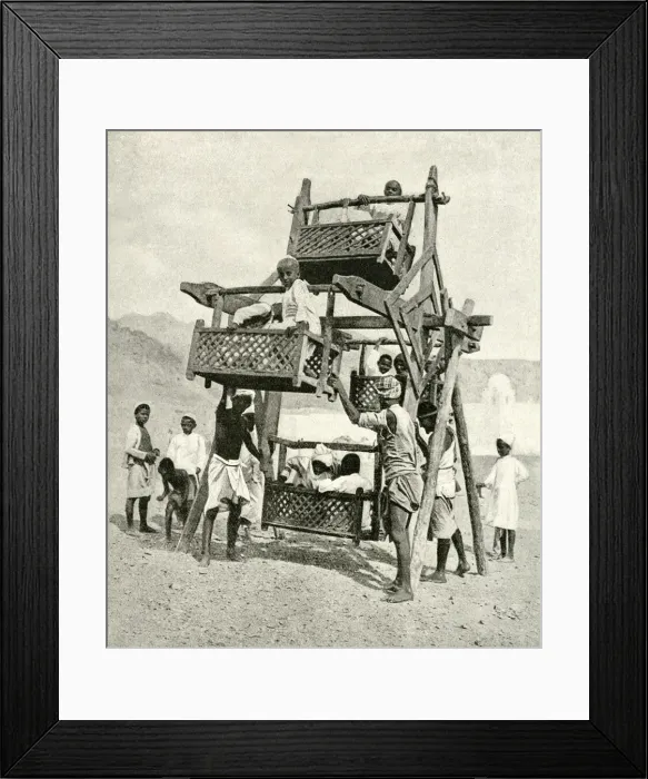 Framed Print : Arab children on playground ride, Gulf of Aden, Arabia