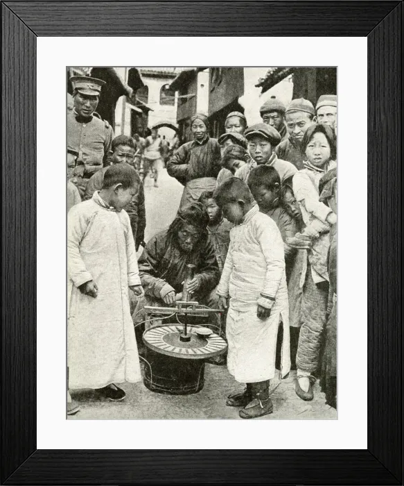 Framed Print : Gambling for sweets at roulette wheel, China, East Asia Framed Print : Gambling for sweets at roulette wheel, China, East Asia