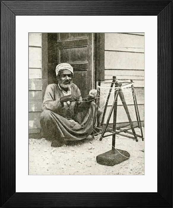 Framed Print : Arab fisherman winding twine for nets, Port Said, Egypt Framed Print : Arab fisherman winding twine for nets, Port Said, Egypt