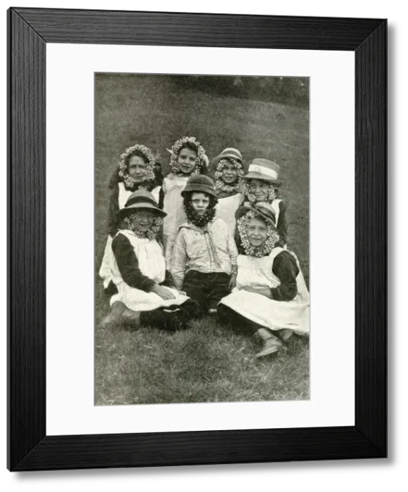 Framed Print : Group of children wearing wild flowers, Somerset, England Framed Print : Group of children wearing wild flowers, Somerset, England