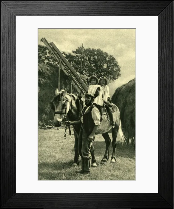 Framed Print : Farmer leading two children on a horse, England Framed Print : Farmer leading two children on a horse, England