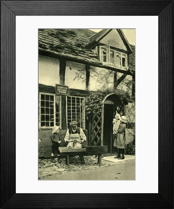 Framed Print : Cobbler at work outside his cottage, Wigmore, Herefordshire Framed Print : Cobbler at work outside his cottage, Wigmore, Herefordshire