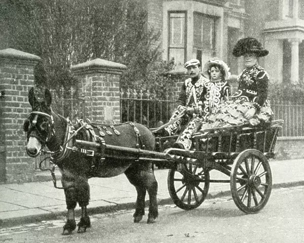 Pearly King, Pearly Queen and daughter, North London