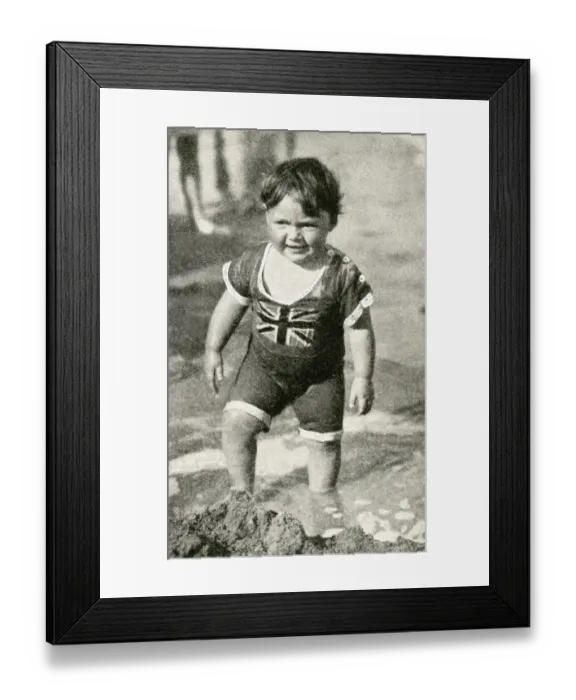 Framed Print : Little boy at the seaside in patriotic British swimsuit Framed Print : Little boy at the seaside in patriotic British swimsuit