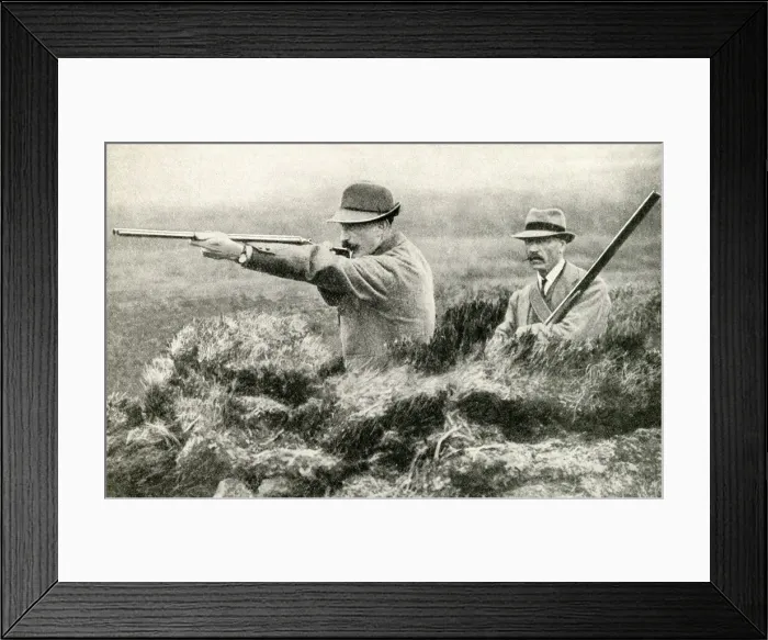 Framed Print : Two men shooting grouse from butts on an English moor Framed Print : Two men shooting grouse from butts on an English moor