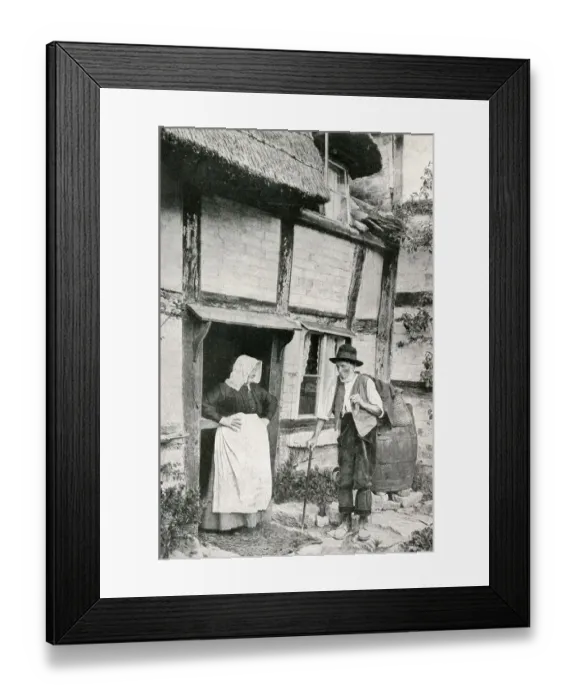 Framed Print : Elderly couple outside cottage, Little Comberton, Worcs Framed Print : Elderly couple outside cottage, Little Comberton, Worcs