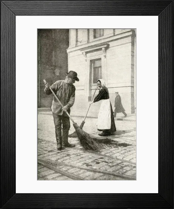 Framed Print : Couple sweeping a street, Helsingfors, Finland Framed Print : Couple sweeping a street, Helsingfors, Finland