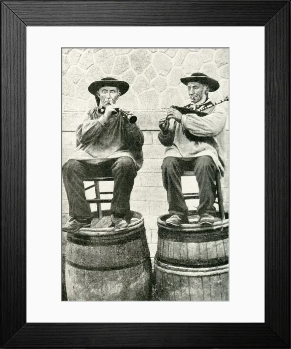Framed Print : Musicians seated on barrels, Brittany, Northern France Framed Print : Musicians seated on barrels, Brittany, Northern France