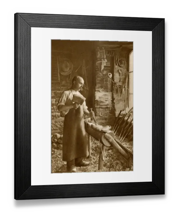 Framed Print : Man making wooden shoes, Brittany, Northern France Framed Print : Man making wooden shoes, Brittany, Northern France