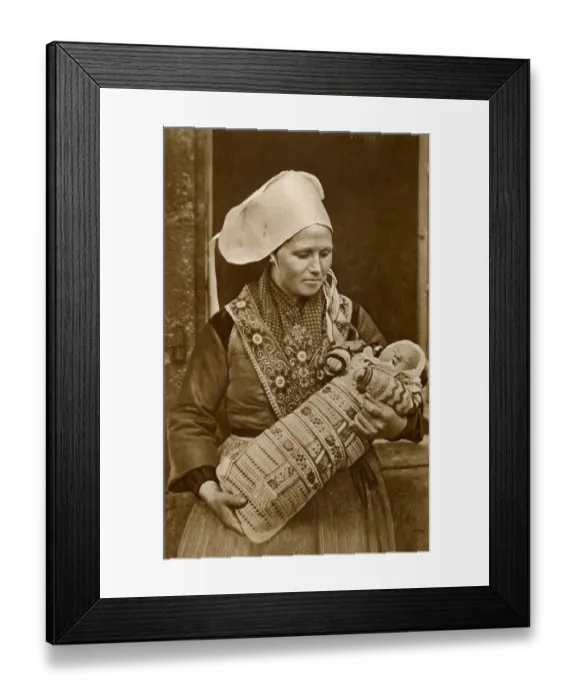 Framed Print : Breton woman with her baby, Brittany, Northern France Framed Print : Breton woman with her baby, Brittany, Northern France
