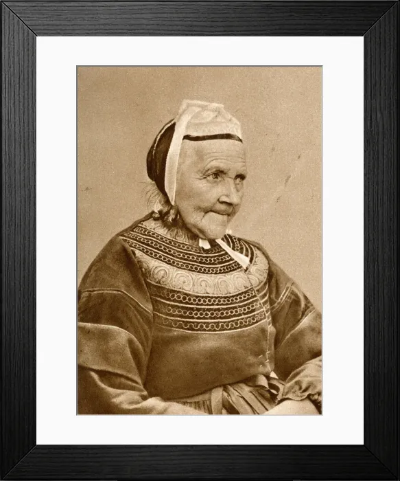 Framed Print : Elderly woman in traditional costume, France Framed Print : Elderly woman in traditional costume, France