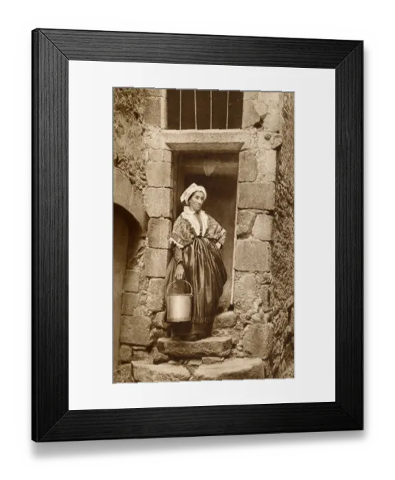 Framed Print : Peasant woman with pail, Auvergne, France Framed Print : Peasant woman with pail, Auvergne, France
