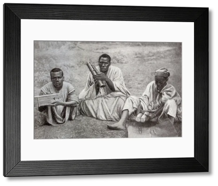 Framed Print : Tribesmen with instruments, Cameroon, Central West Africa Framed Print : Tribesmen with instruments, Cameroon, Central West Africa