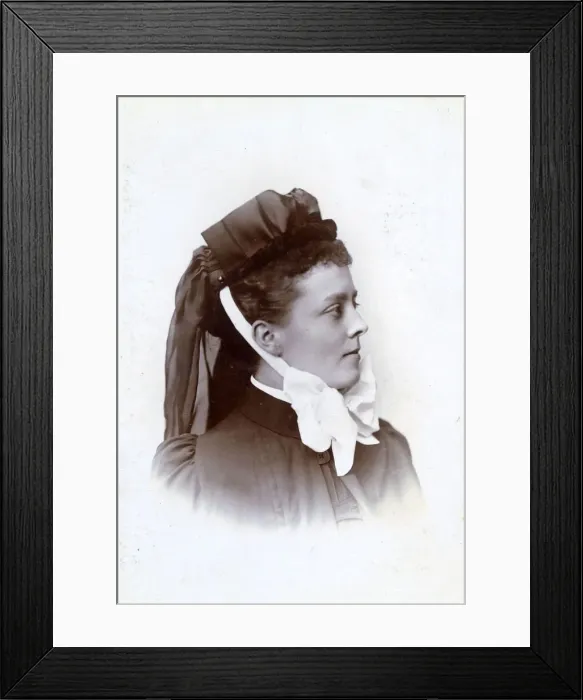 Framed Print : Young nurse with bonnet tied on with fancy white ribbon Framed Print : Young nurse with bonnet tied on with fancy white ribbon
