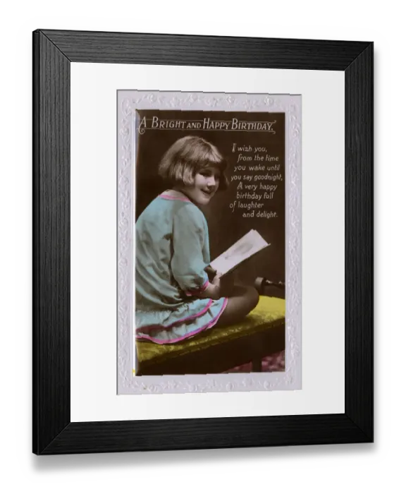 Framed Print : Little girl holds a birthday card Framed Print : Little girl holds a birthday card