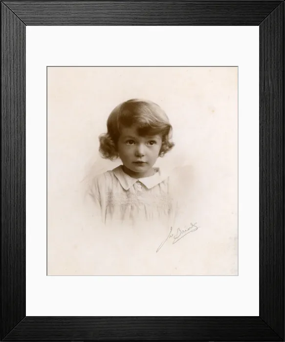 Framed Print : Studio portrait of little girl, circa 1930s Framed Print : Studio portrait of little girl, circa 1930s