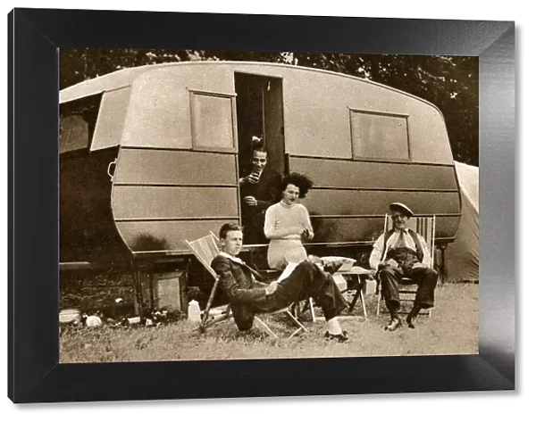 Gracie Fields, singer and actress, outside her caravan