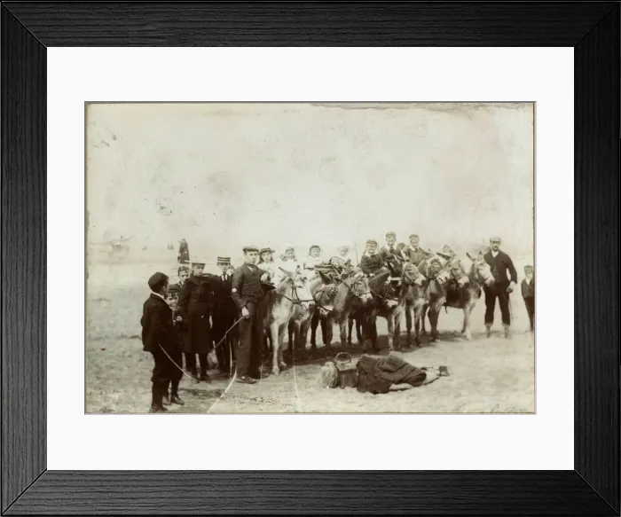 Framed Print : Holidaymakers with donkeys at the seaside Framed Print : Holidaymakers with donkeys at the seaside