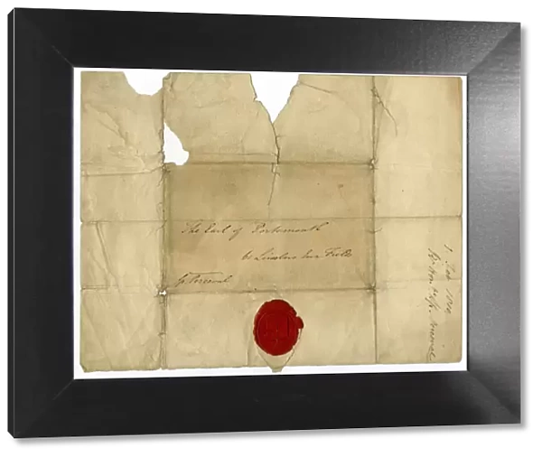 Handwritten address on a letter with red sealing wax