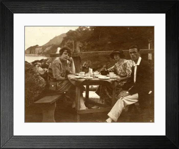 Framed Print : Two women and a man at the seaside Framed Print : Two women and a man at the seaside