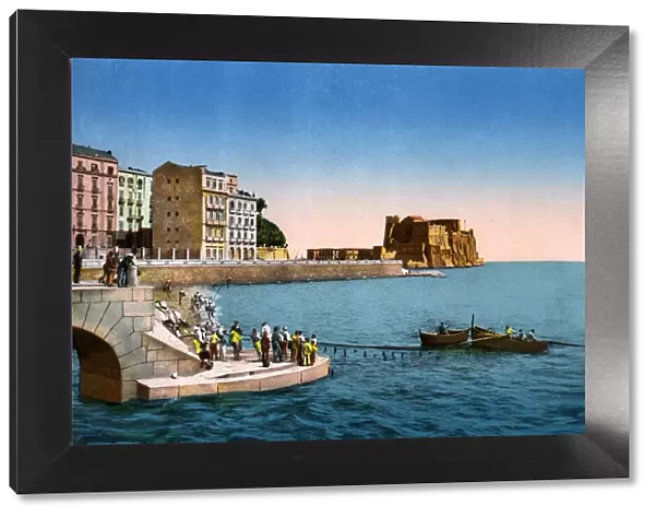 Via Partenope with fishermen and nets, Naples, Italy