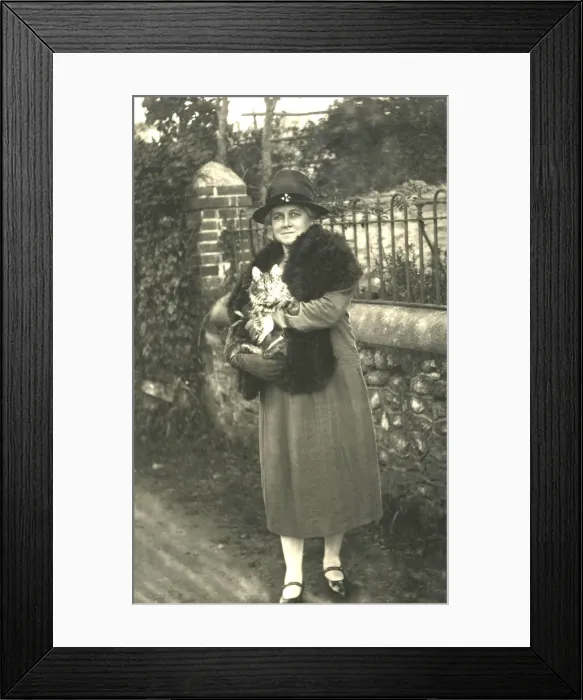 Framed Print : Woman holding a cat Framed Print : Woman holding a cat